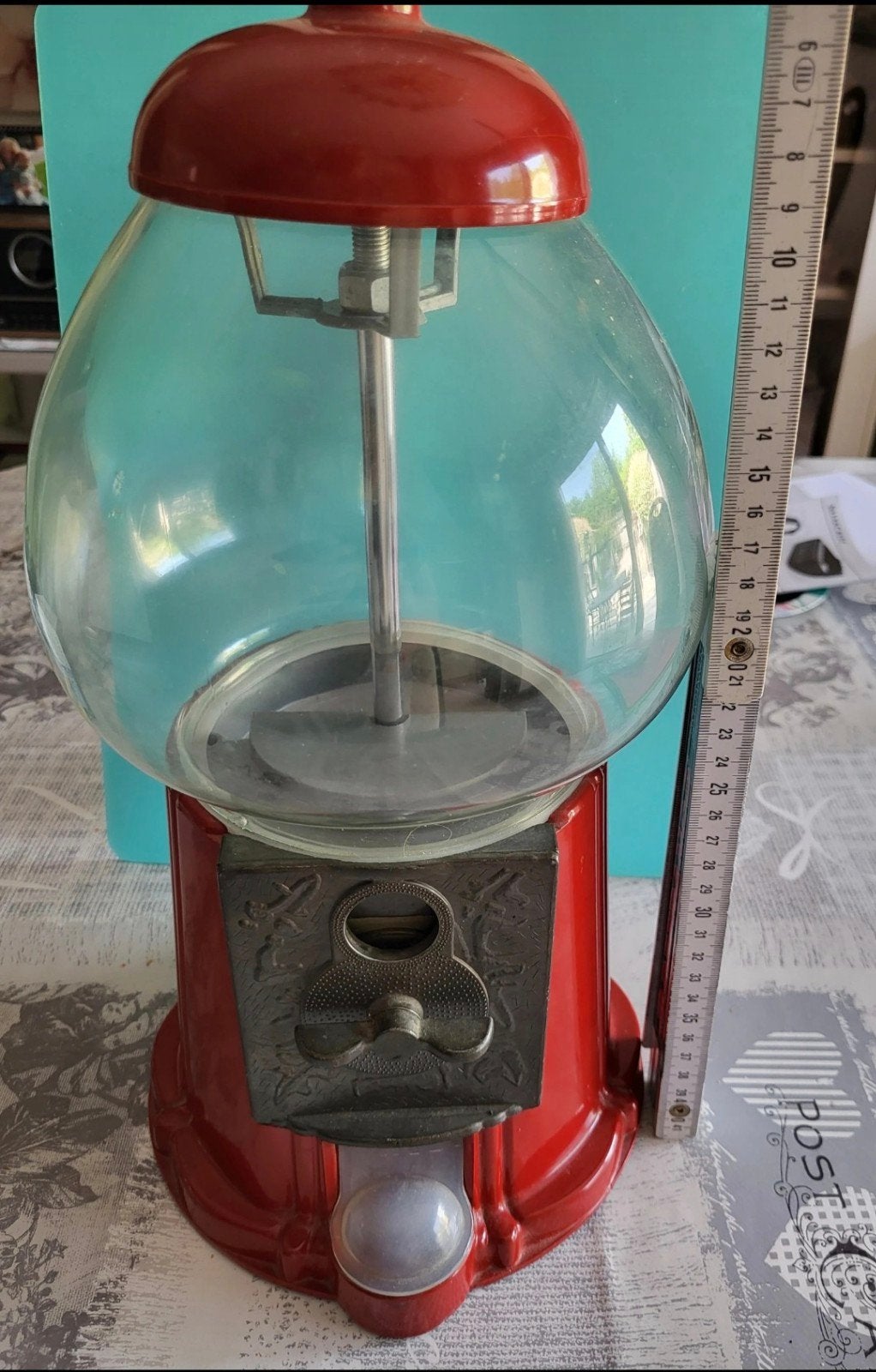 Vintage kauwgomballen automaat, Ophalen