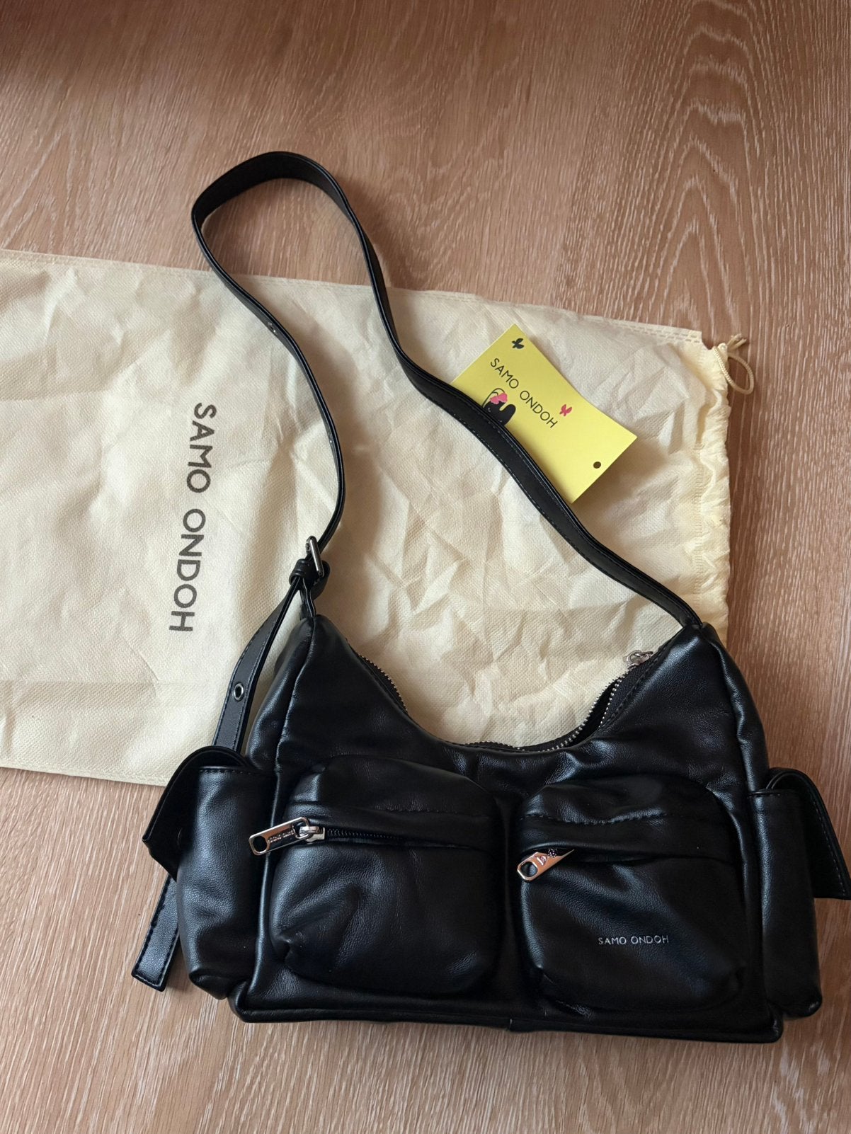 Sac samo ondoh pocket mug M nappa noir, Bijoux, Sacs & Beauté, Enlèvement ou Envoi, Comme neuf, Noir