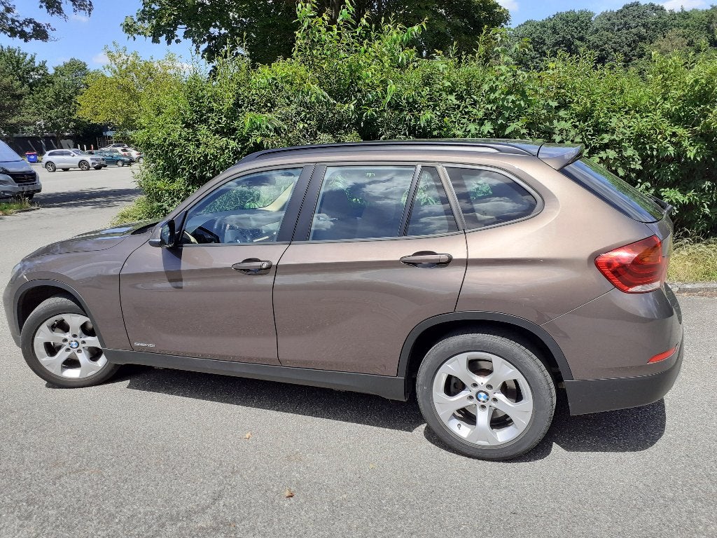 BMW X1 benzine automaat in nieuwstaat, 62000KM, 2013, Achterwielaandrijving, 4 cilinders, Bruin, Leder