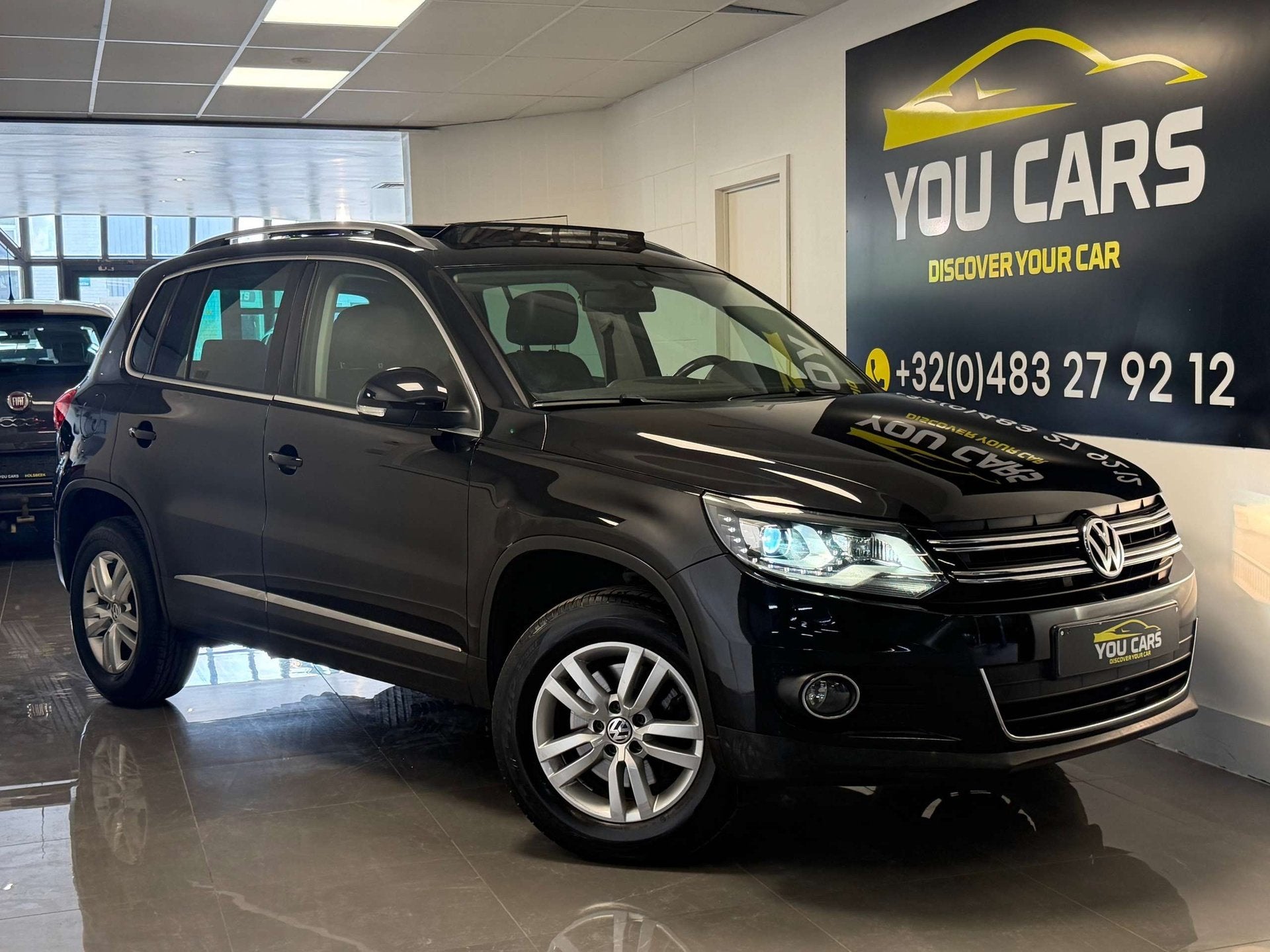 Volkswagen Tiguan 1.4 TSI Sport 1 Jaar Garantie, 90 kW, 122 pk, Gebruikt, Zwart