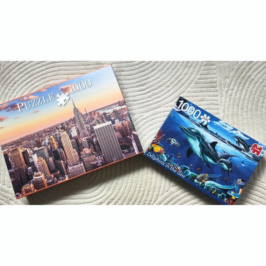 1000 delige-puzzel Dolfijnen in de zee en New york cty, Hobby & Loisirs créatifs, Sport cérébral & Puzzles, Enlèvement ou Envoi