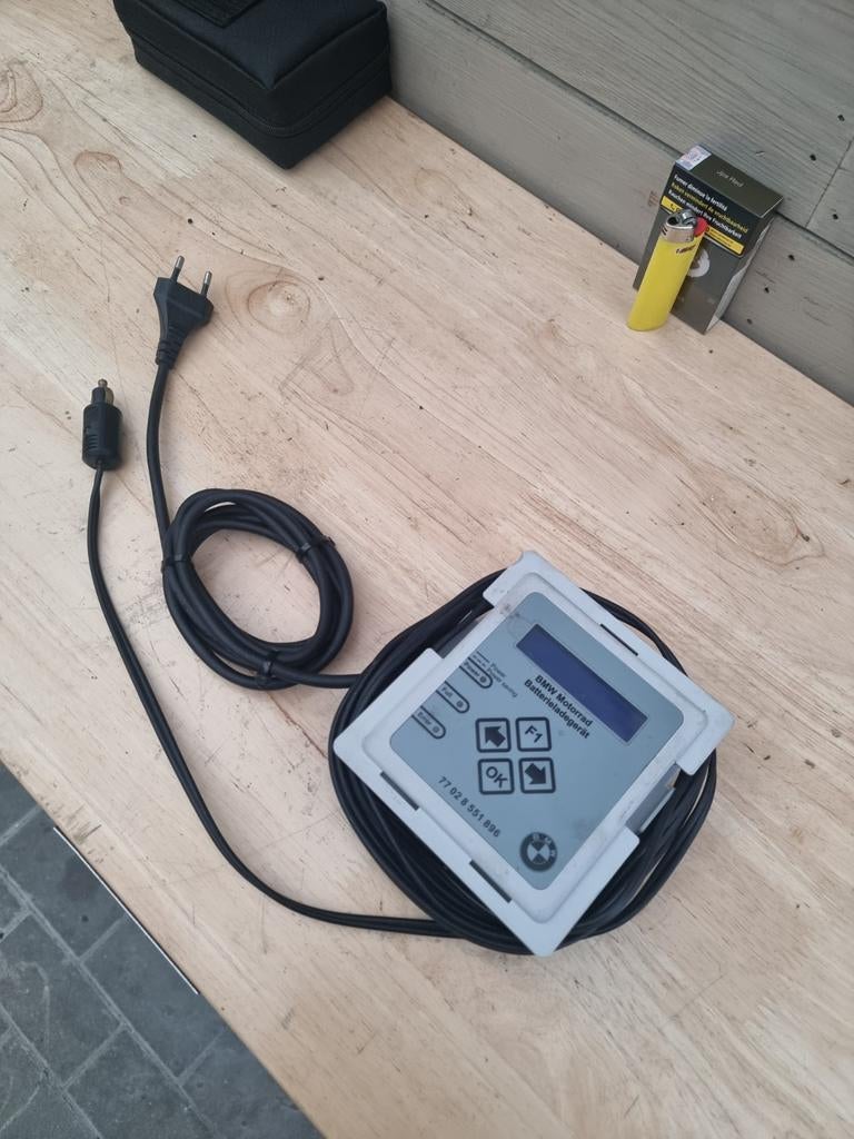 Bmw batterij lader, Ophalen