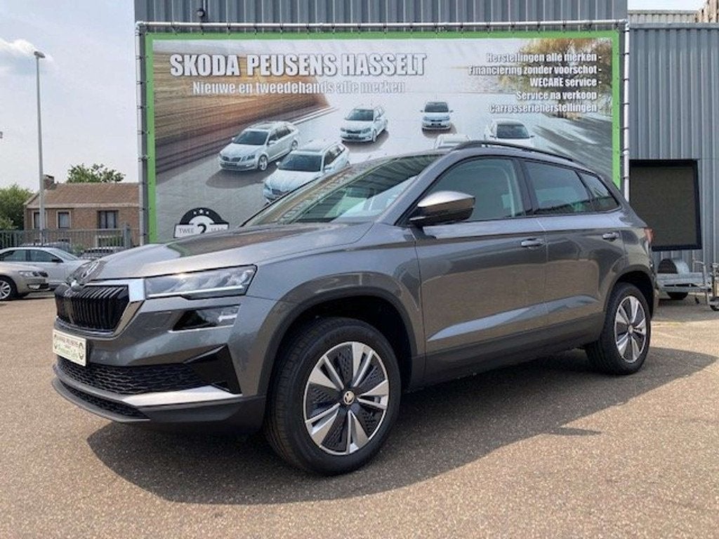 Skoda Karoq 1.0 TSI Family, Auto's, Stof, Overige kleuren, Karoq, Bedrijf