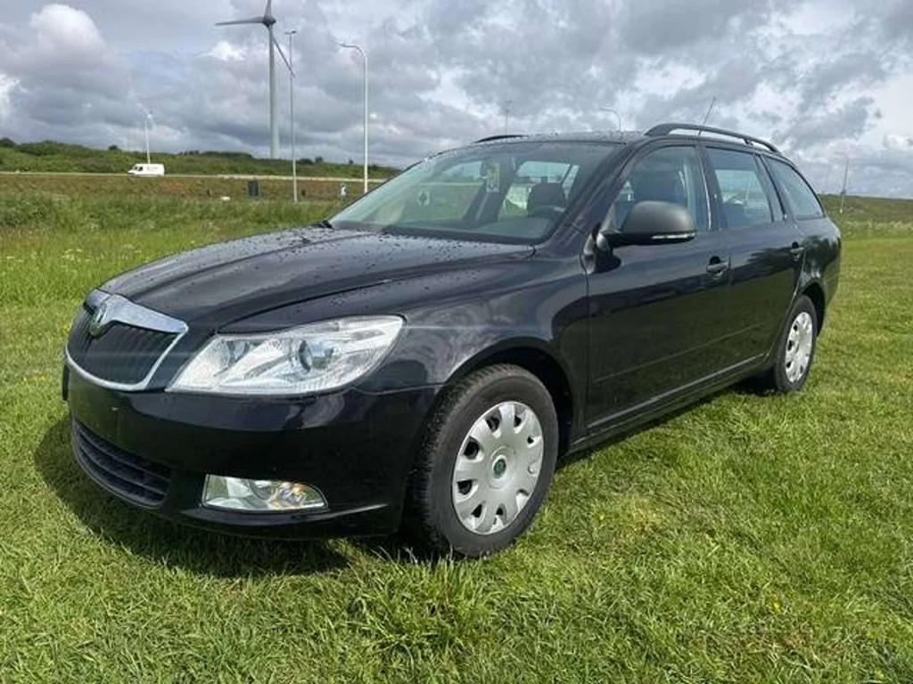 Skoda Octavia Octavia SW 1.2 TSI / Garantie 12m. (bj 2011), Gebruikt, Zwart, 4 cilinders, Zwart