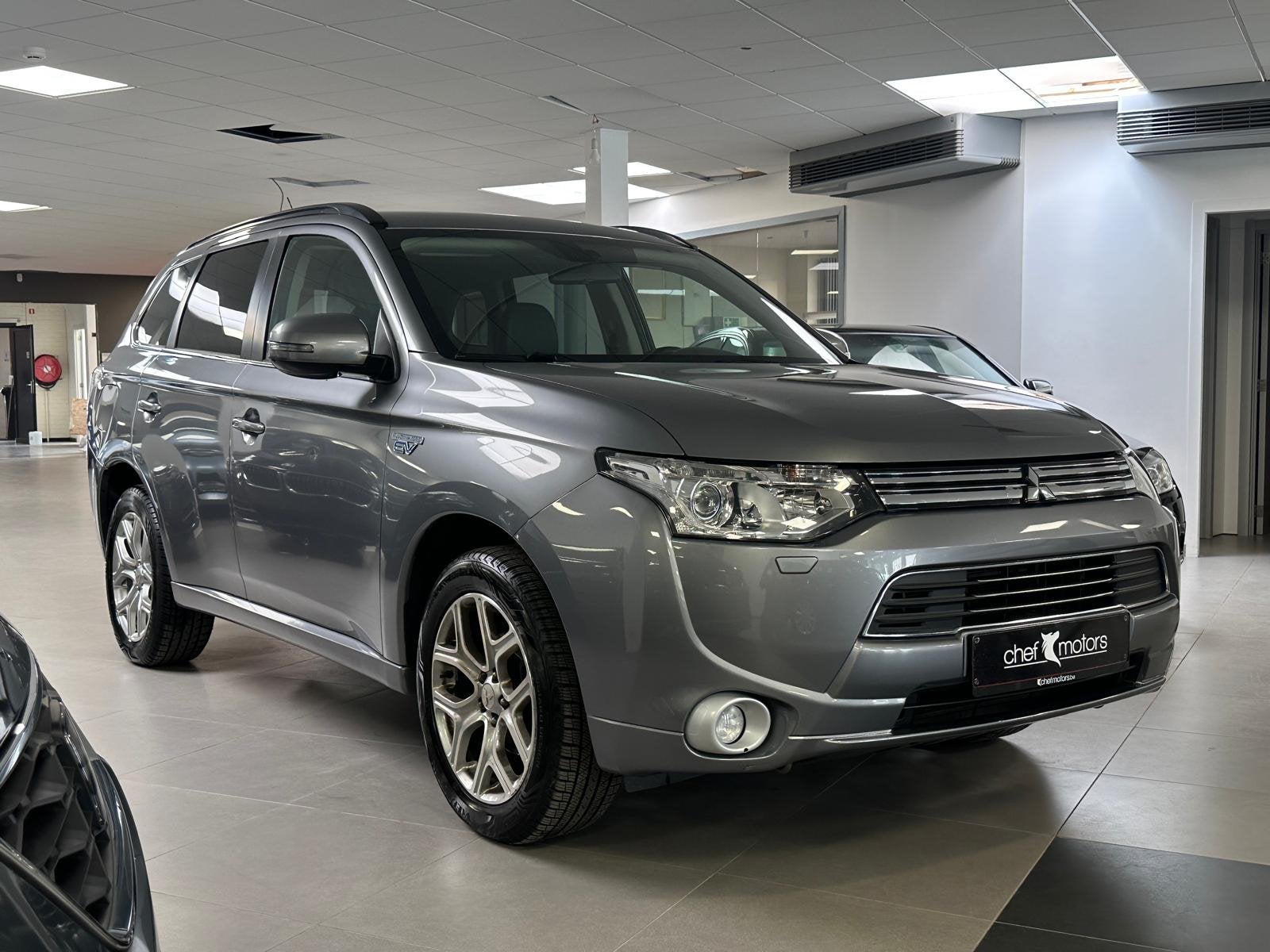 Mitsubishi Outlander 2.0 PHEV 4WD, Auto's, Automaat, 4 cilinders, Bedrijf, 5 zetels