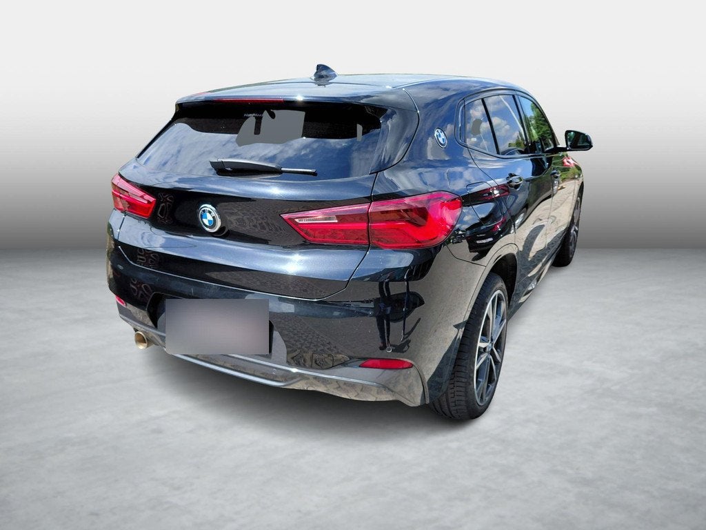 BMW X2 sDrive18i M-Pakket 100kW DCT, Auto's, Gebruikt, Zwart, Zwart, Bedrijf