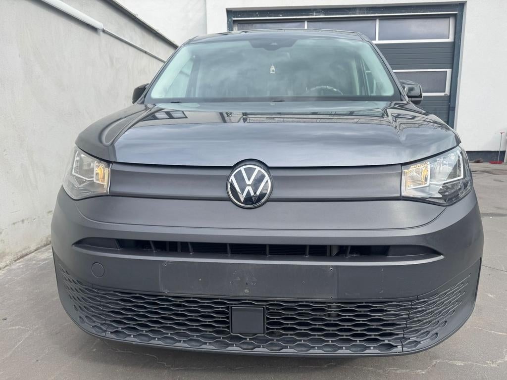 Vw Caddy 2.0 TDI / 7 Plaatsen, Auto's, Volkswagen, Bedrijf, Elektrische buitenspiegels, Radio, Zwart, Zwart, Ophalen