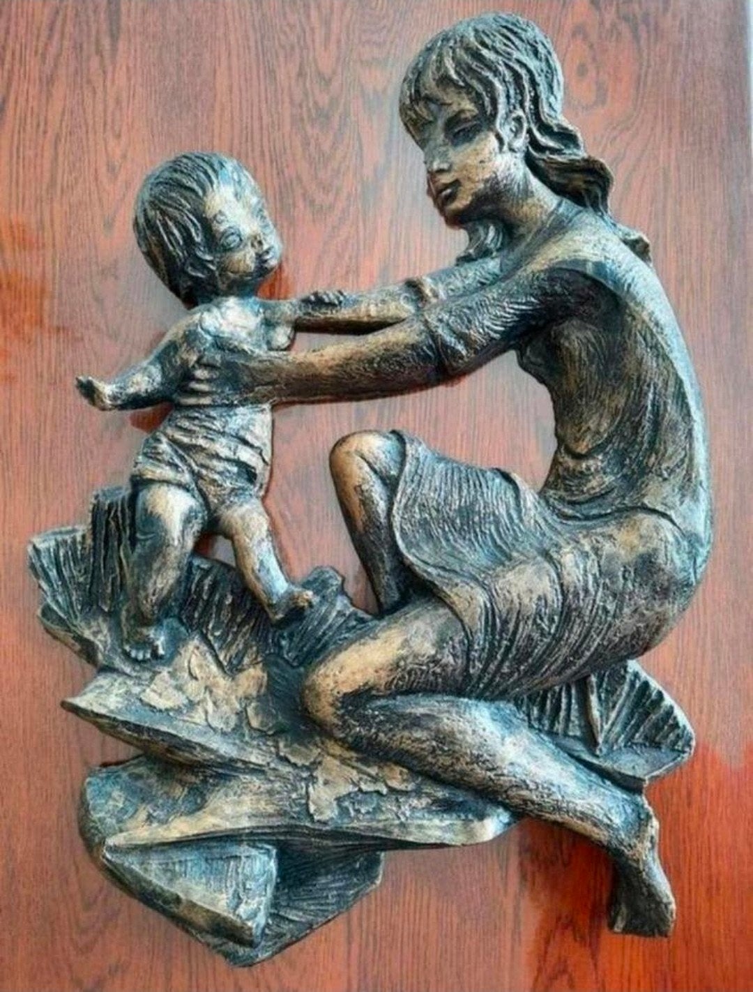 Wandsculptuur Moeder en kind, Ophalen