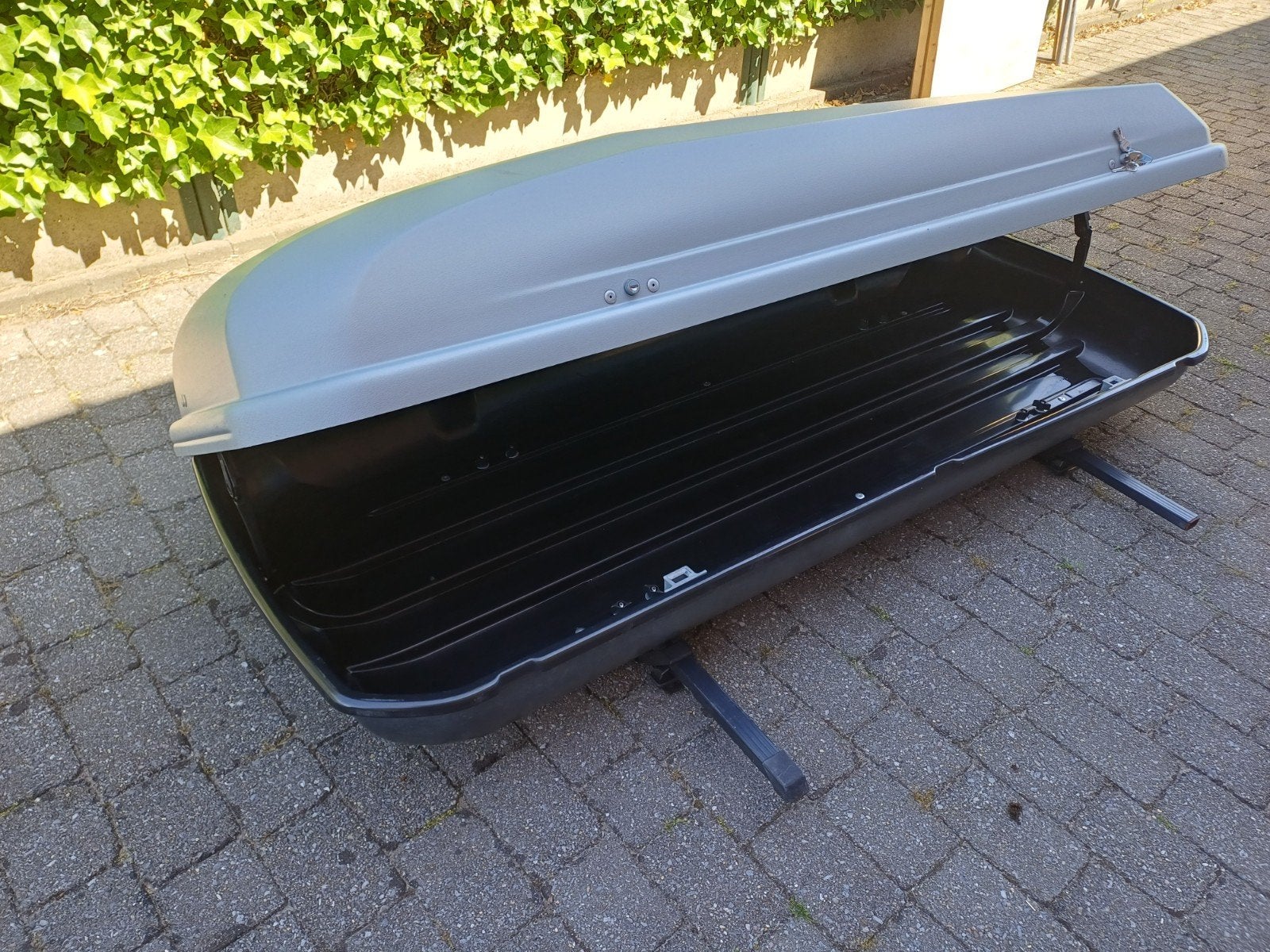 Grote dakkoffer 450 L, Ophalen