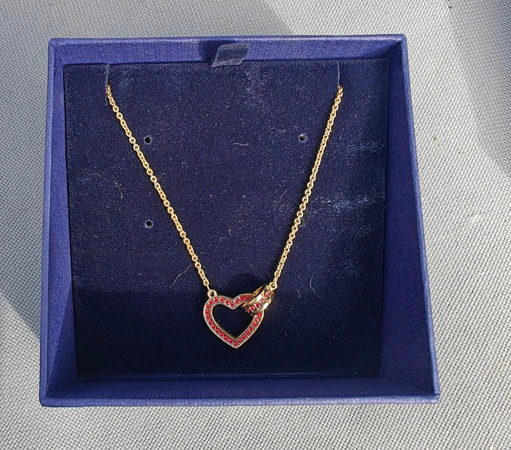 Nieuwe ongedragen halsketting van Swarovski, Ophalen