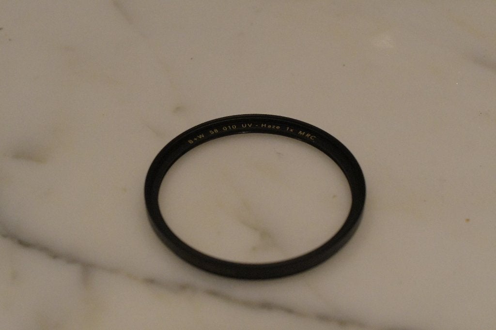 Filtre anti-brume UV B+W 010 1X MRC F-PRO 58 mm, Enlèvement ou Envoi, 50 à 60 mm, Comme neuf, Filtre UV