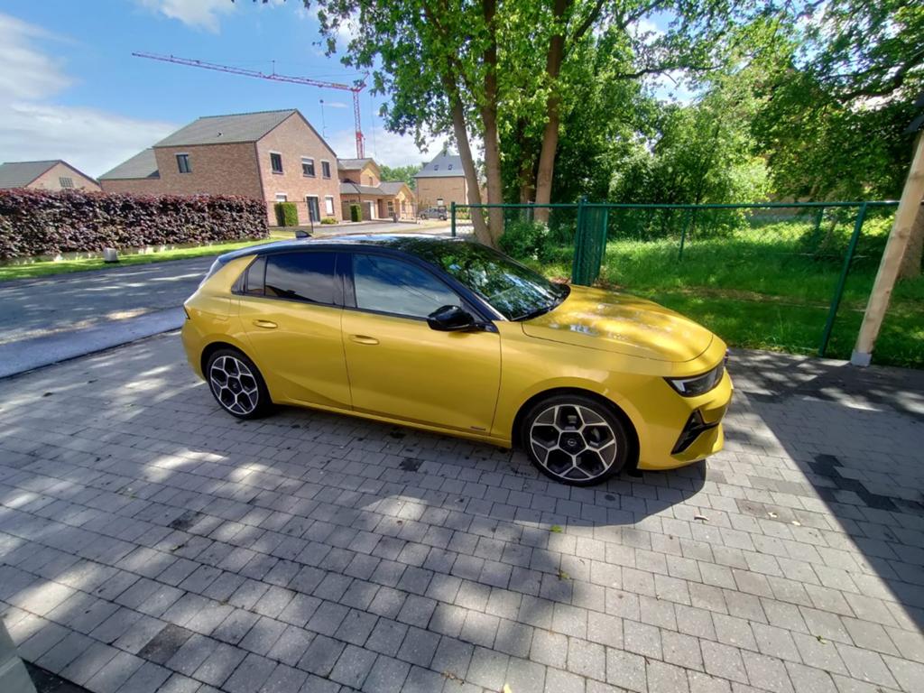 Opel Astra L hatchback 2023 75000km, Auto's, Alcantara, Geel, 96 kW, 5 zetels