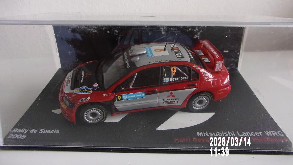 MITSUBISHI LANCER WRC.ROVANPERA SUEDE 05.IXO 1/43 COMME NEW, Enlèvement ou Envoi, Neuf, Voiture, Autres marques