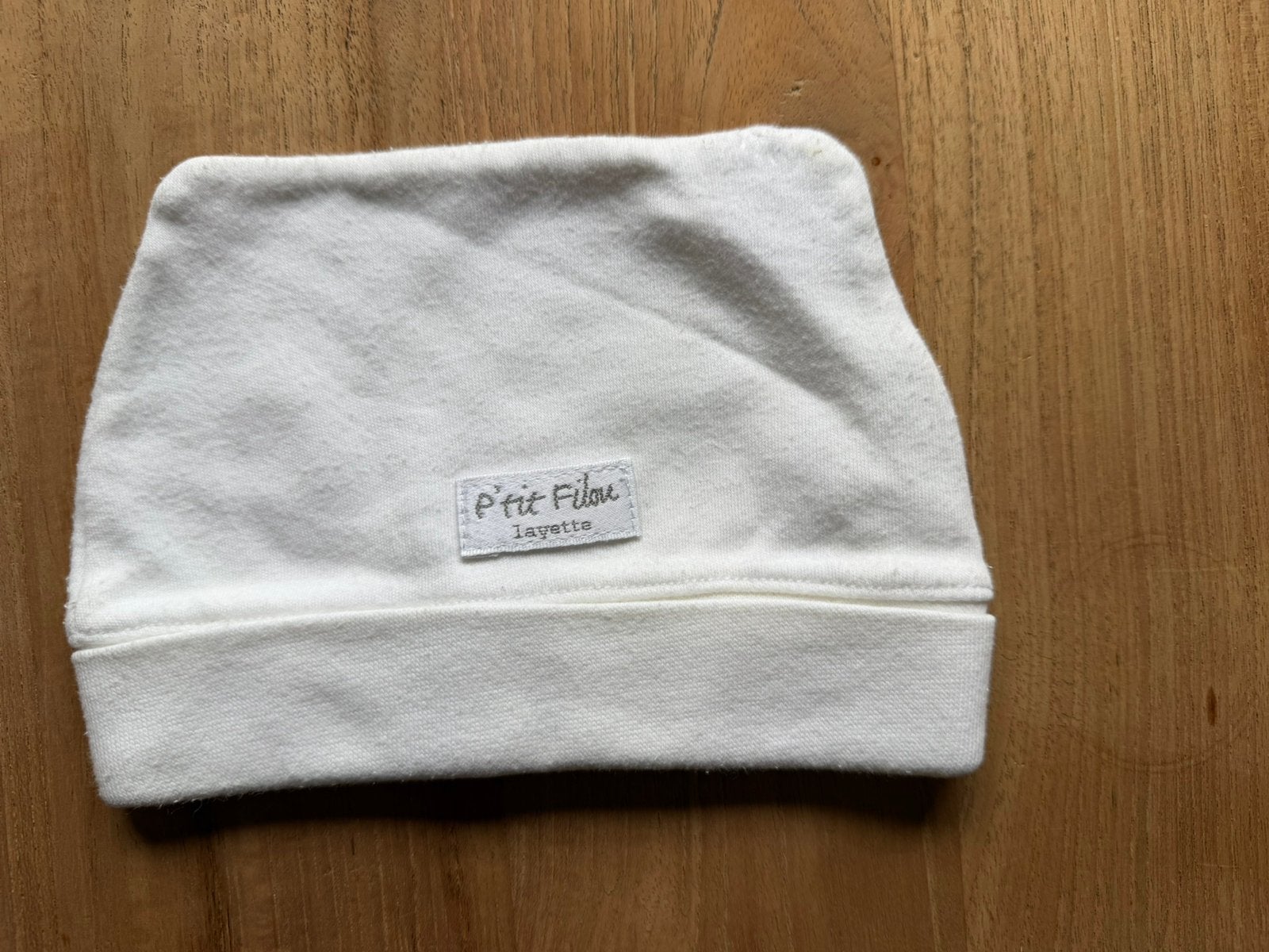 Wit mutsje P’tit Filou maat 0, Enfants & Bébés, Vêtements de bébé | Bonnets, Écharpes & Moufles, Garçon ou Fille, Taille 50, Enlèvement ou Envoi