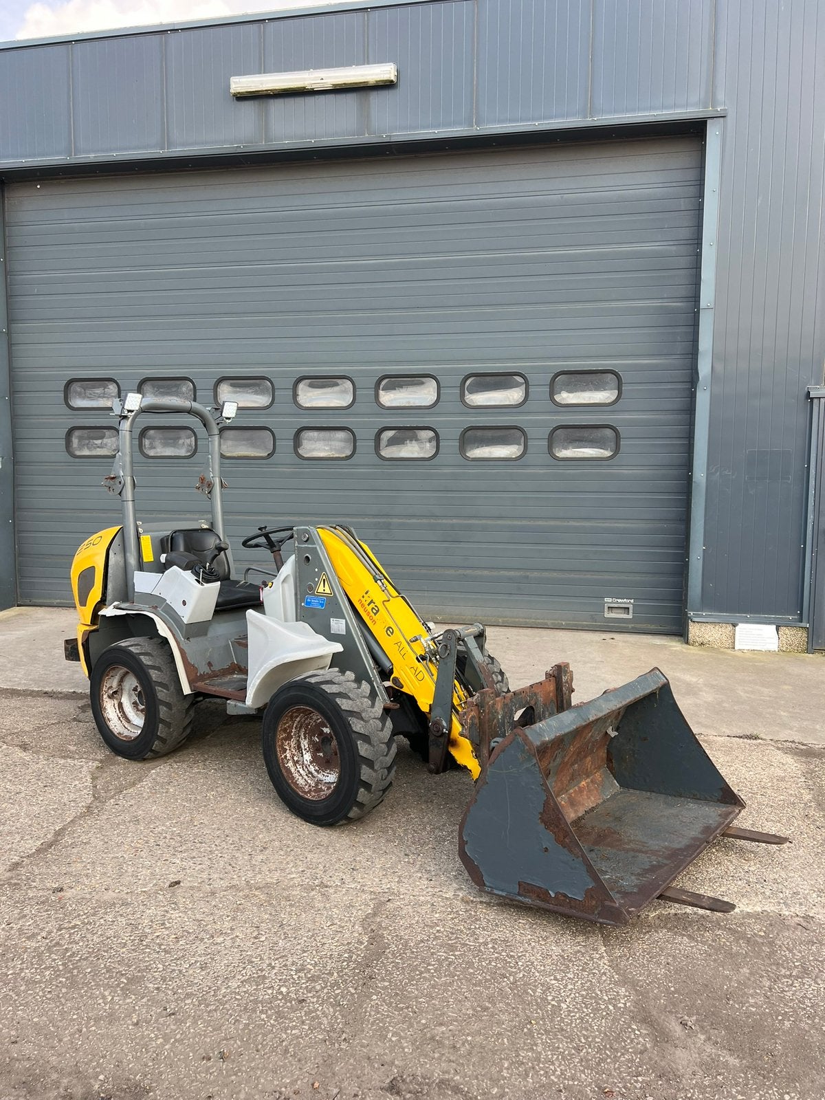 Kramer Allrad 250 shovel kniklader, Ophalen