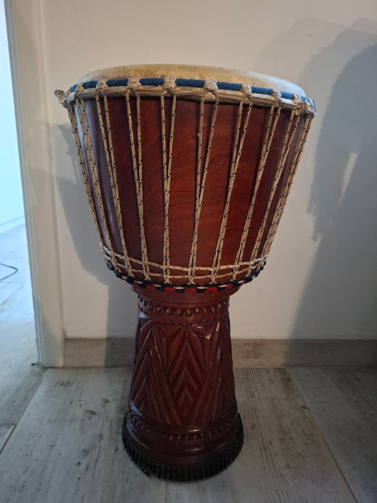 Djembé africain., Ophalen