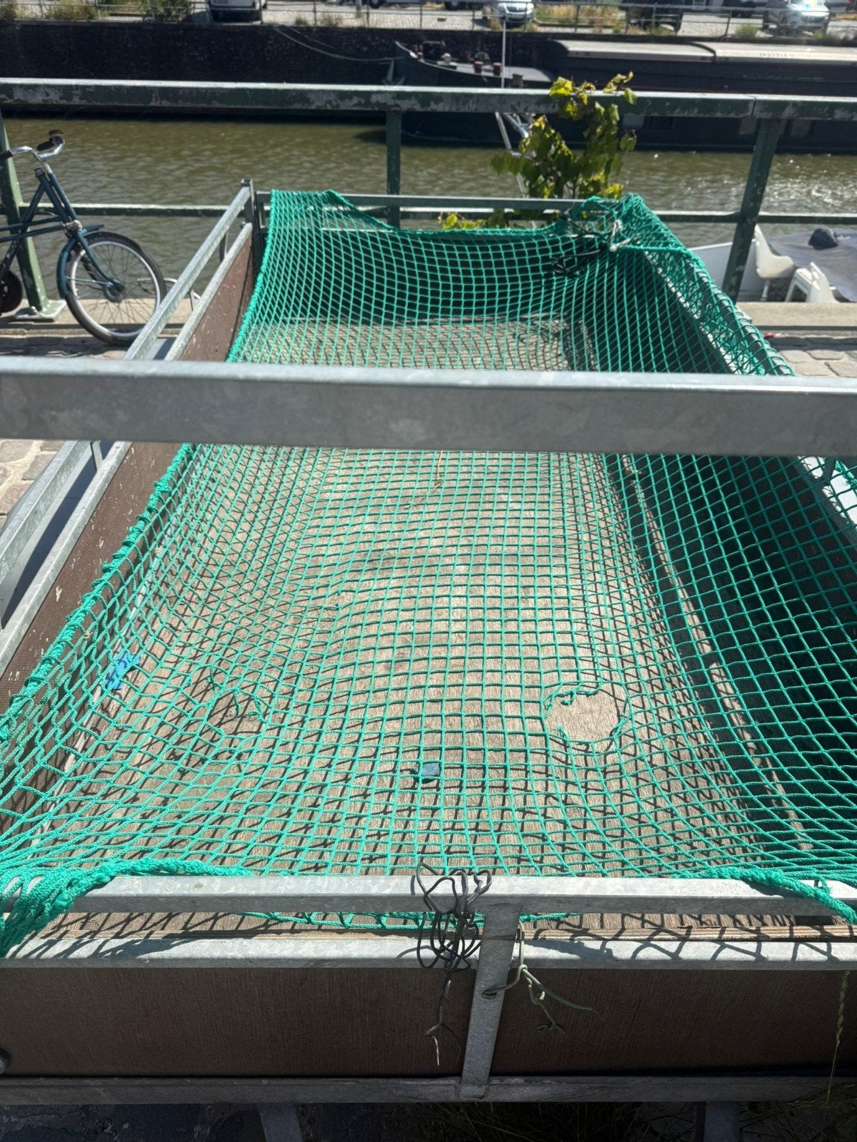 Dubbelas aanhangwagen 750 kio, Enlèvement