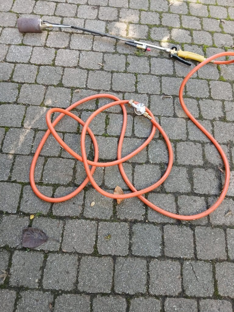 Onkruidbrander-roofingbrander, Ophalen