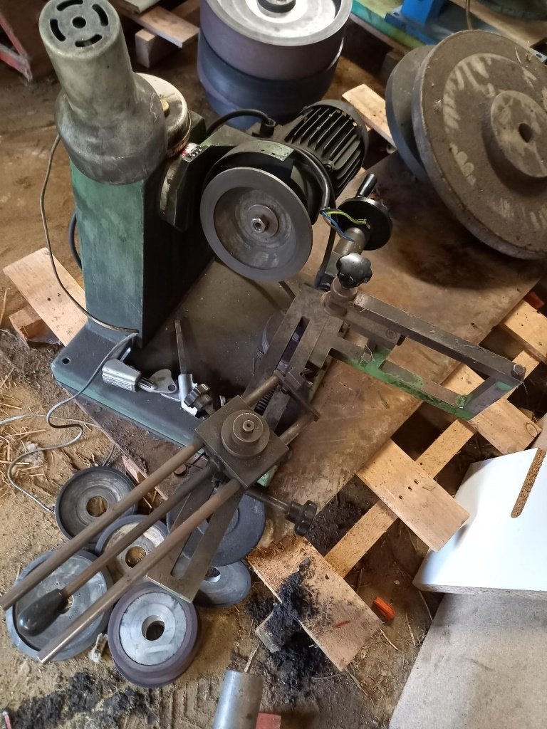 slijpmachine voor zaagbladen, Ophalen