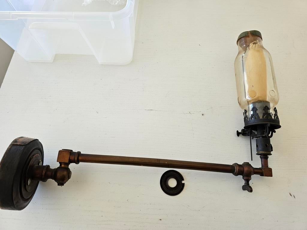 zwenkarm wandlamp van 1901, Ophalen