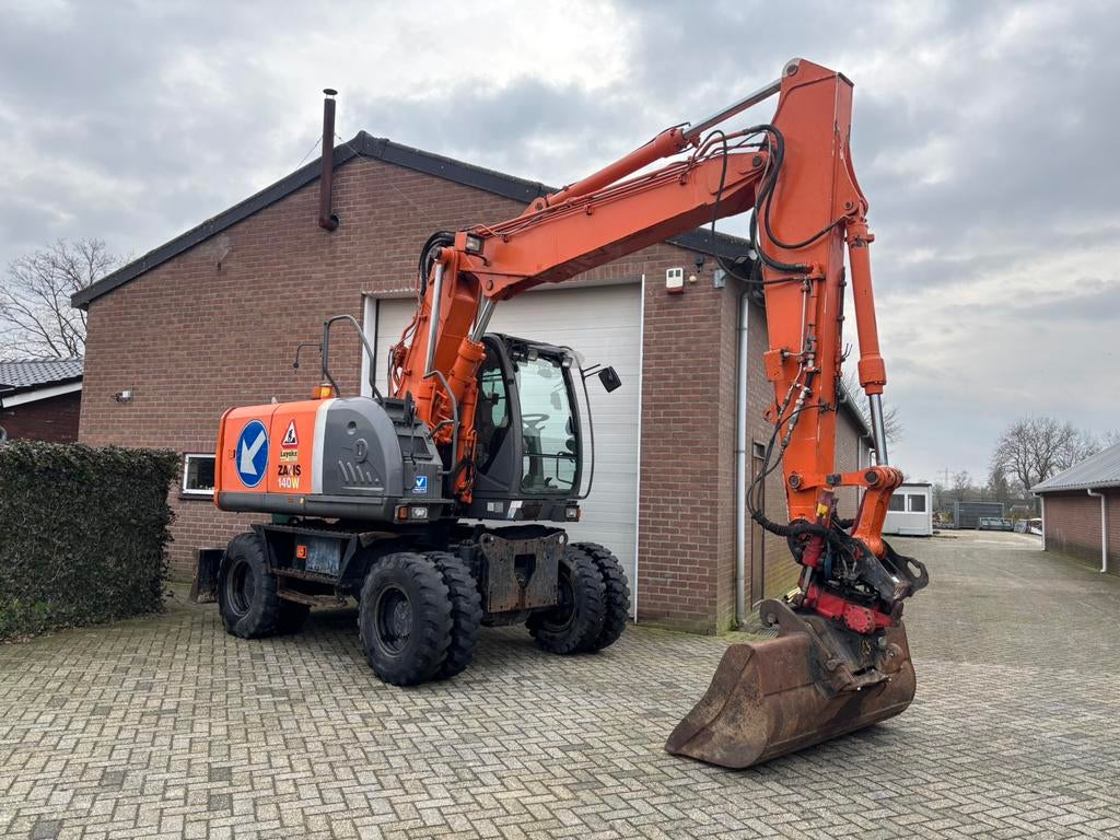 Hitachi ZX140W-3 bandenkraan graafmachine Rototilt!, Ophalen