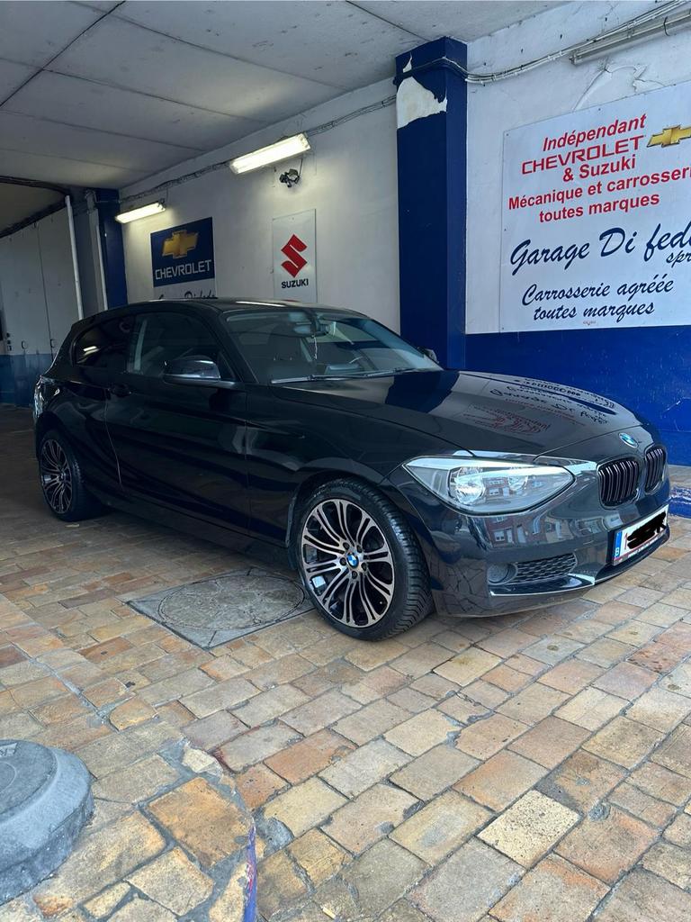 BMW 114i 2013 1.4i 75kw 102 pk 148.000 km CarPlay, Auto's, BMW, Voorwielaandrijving, 1 Reeks, Zwart, 4 cilinders