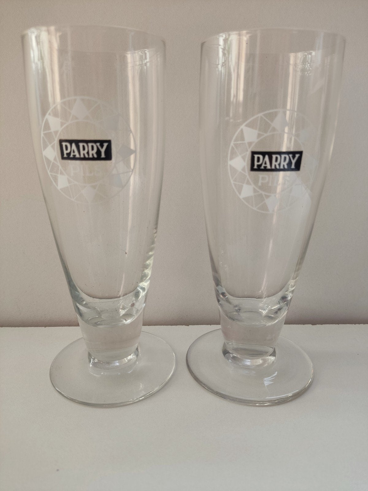2x Retro  bierglazen Parry Pils -  Vlaamsche brouwerij, Ophalen, Zo goed als nieuw, Glas of Glazen, Overige merken