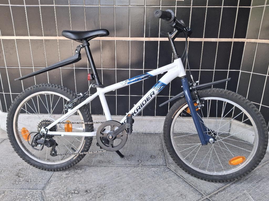 VTT enfant Rockrider 20 pouces + gardeboue + béquille + lumi, Enlèvement, Comme neuf, Frein sur jante, Autres marques