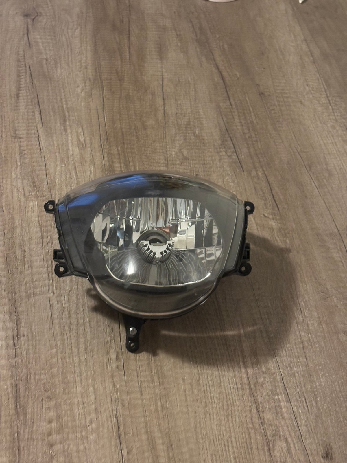 Piaggio zip koplamp met teller glas, Ophalen