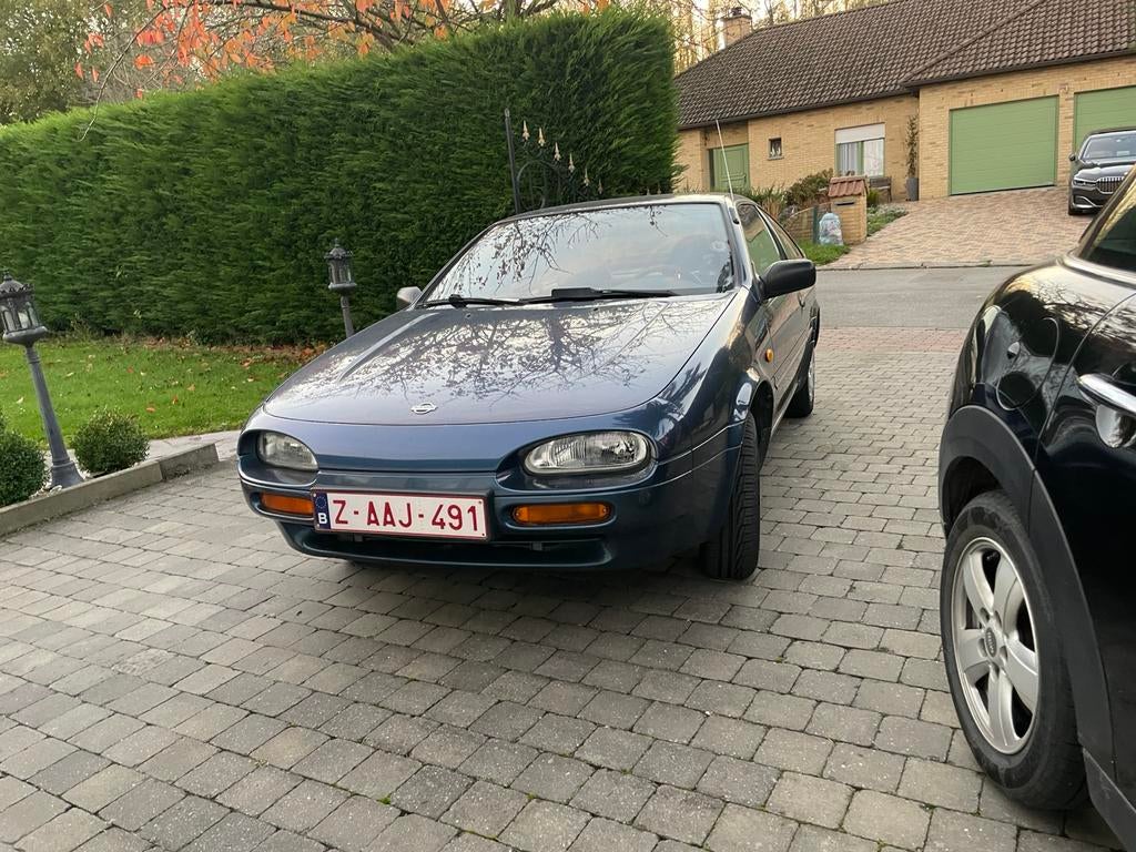 Nissan 100 nx 1600 cc zeer mooie 89.000 km als nieuw, Blauw, Bedrijf, Handgeschakeld, Onderhoudsboekje