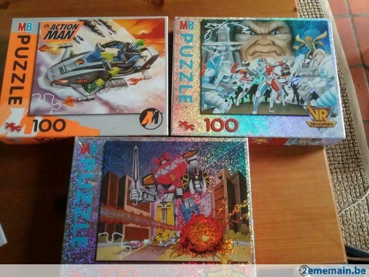 2 puzzles 100p power ranger sur, action man,, Enlèvement ou Envoi, Plus de 50 pièces, Utilisé