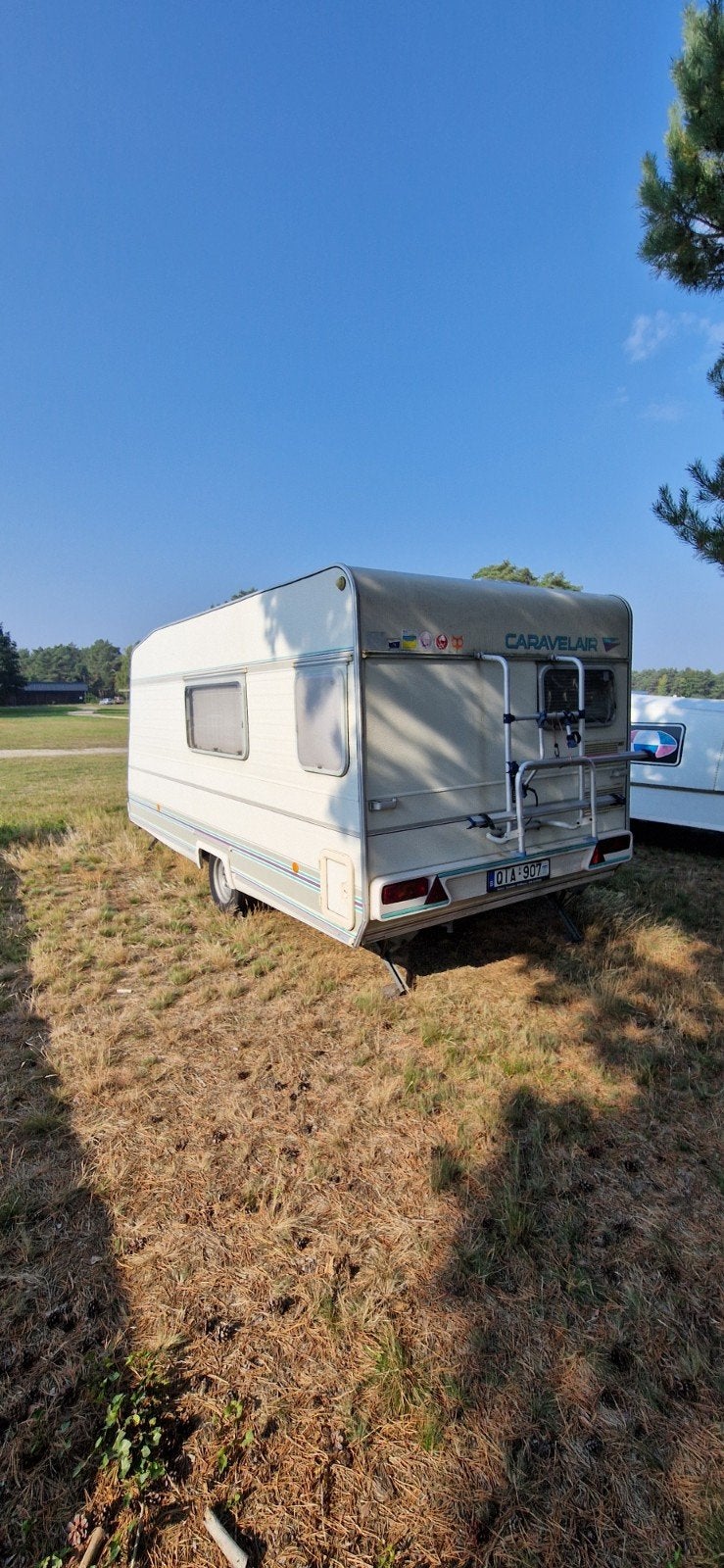 Caravan met groot voortent, Ophalen