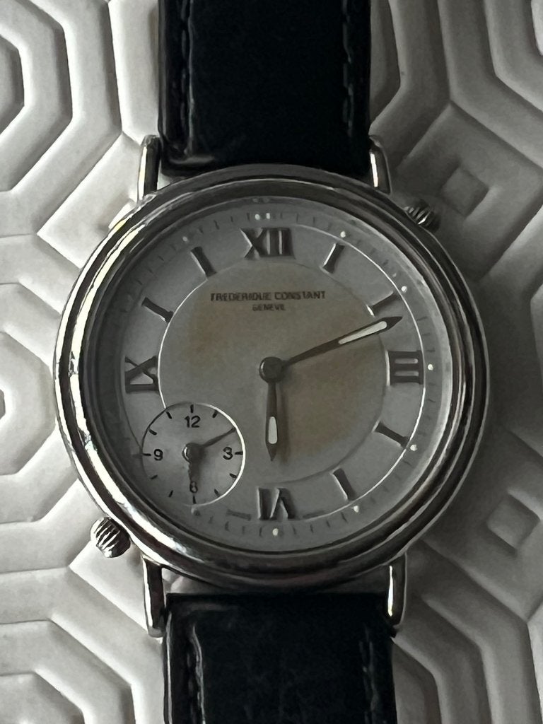 Montre Frédéric constant double fuseau horaire, Bijoux, Sacs & Beauté, Montres | Anciennes | Antiquités, Enlèvement ou Envoi, Acier