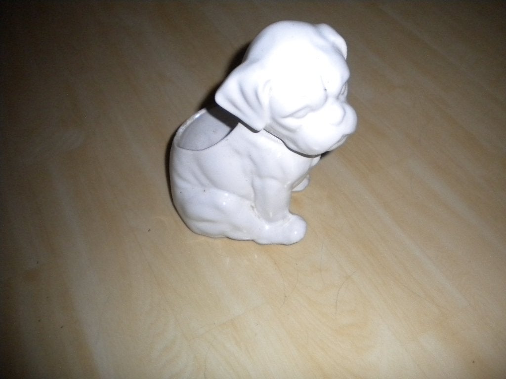 Hondje voor een bloem of plantje in te plaatsen, Ophalen