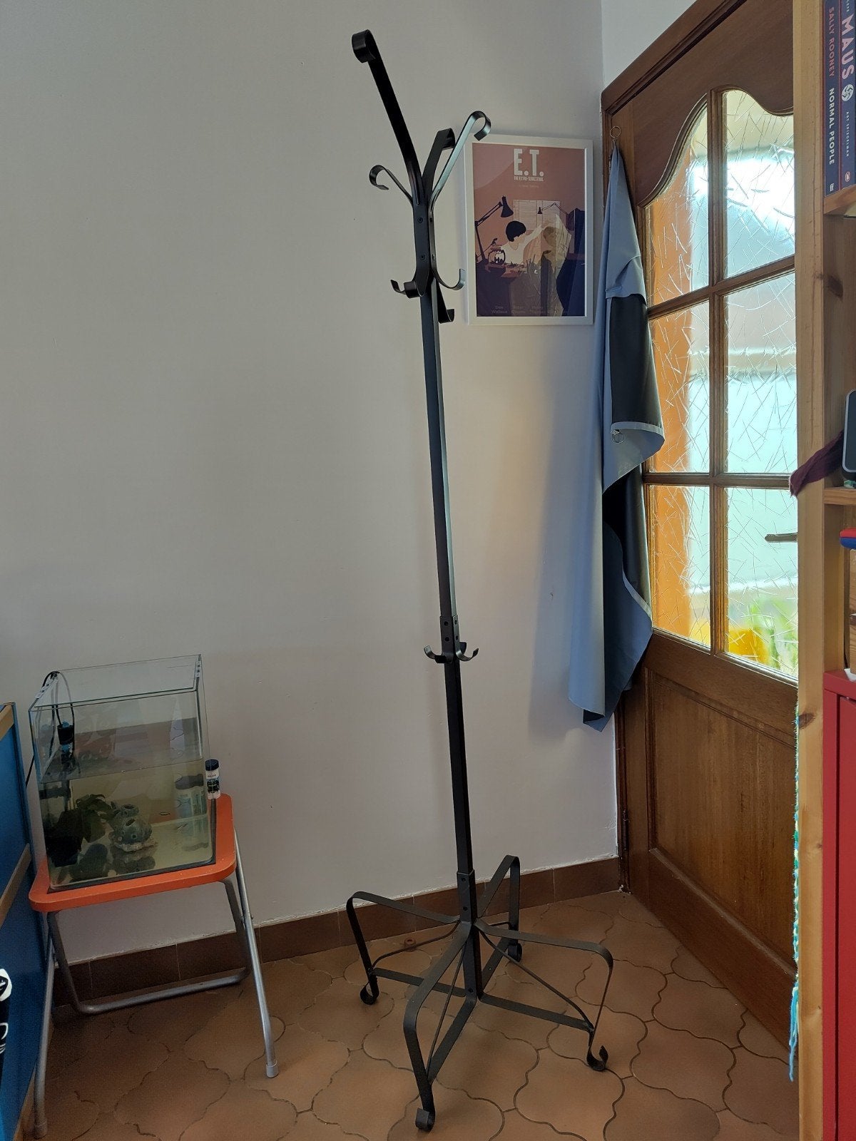 porte-manteau sur pied, Ophalen