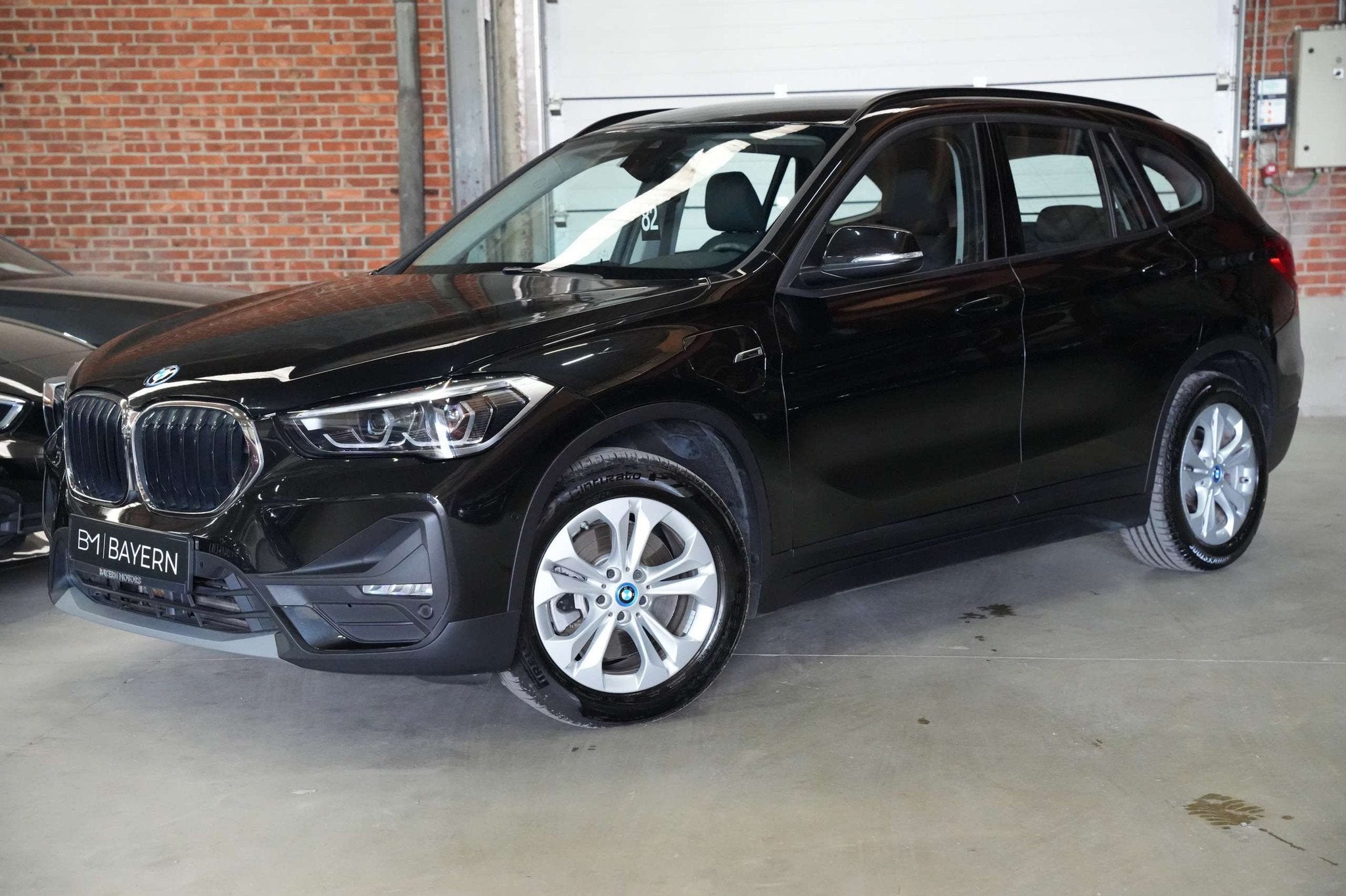 BMW X1 1.5iA xDrive25e Garantie Hybride Plug in Benzine E, Stof, Gebruikt, Zwart, https://public.car-pass.be/vhr/ab29a03d-fe57-4288-96ba-f9239f66fdb0