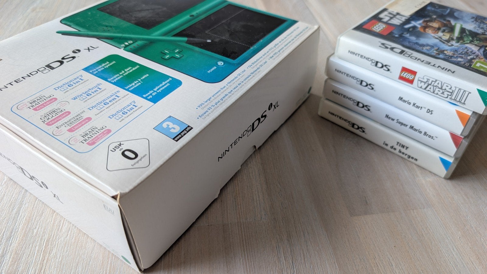 Nintendo DSi XL groen, in box, 4 games, Consoles de jeu & Jeux vidéo, Consoles de jeu | Nintendo DS, Dsi XL, Comme neuf, Avec jeux