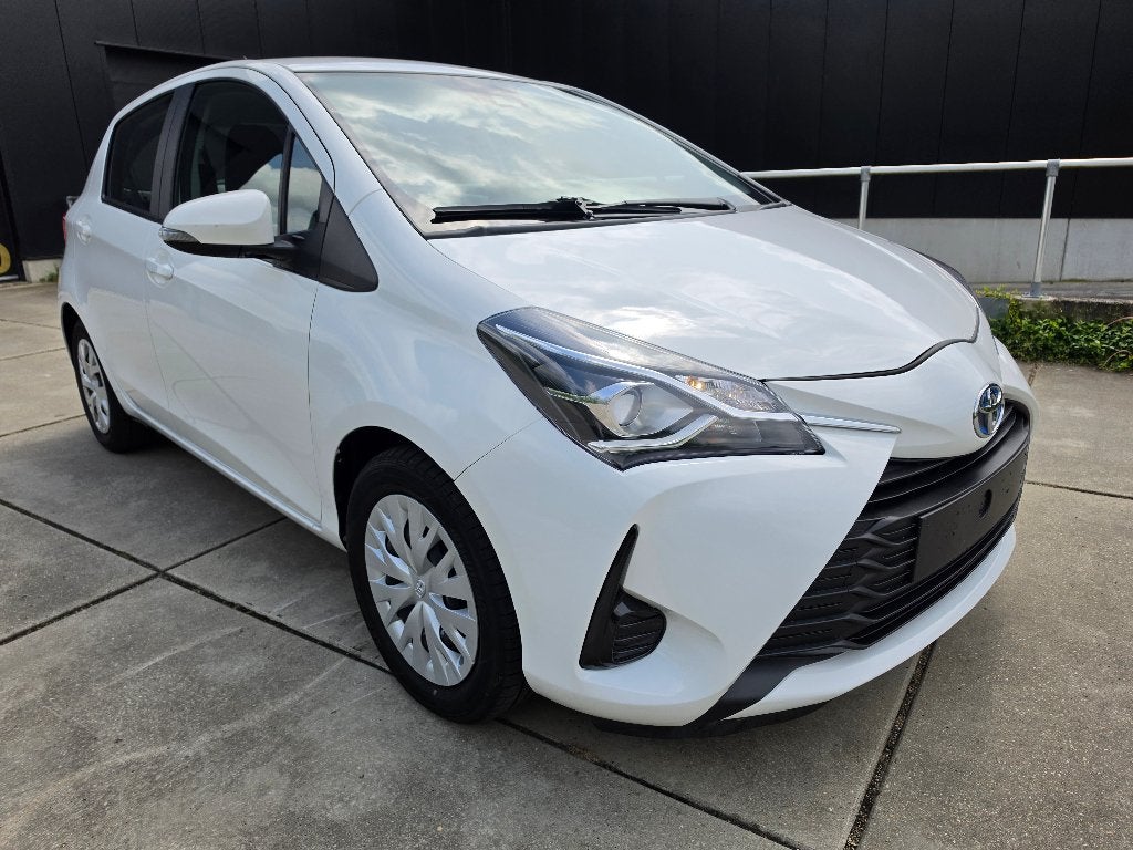 Toyota Yaris 1.5 Hybrid Comfort Navi 37.000 km + Garantie, Auto's, Automaat, 1497 cc, Navigatiesysteem, Wit