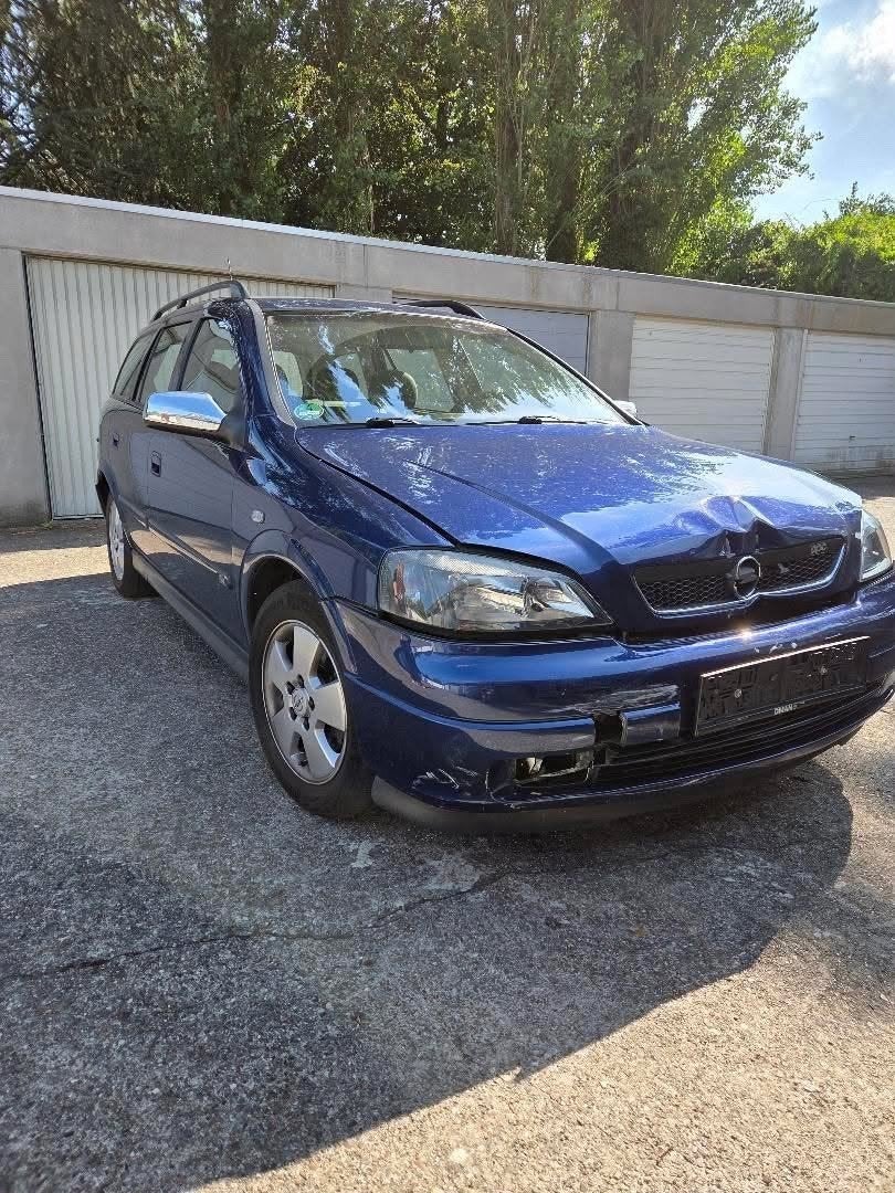 Voiture endommagée par une Opel Astra G cassée., Autos, Opel, Achat, 5 portes, Particulier, Tissu