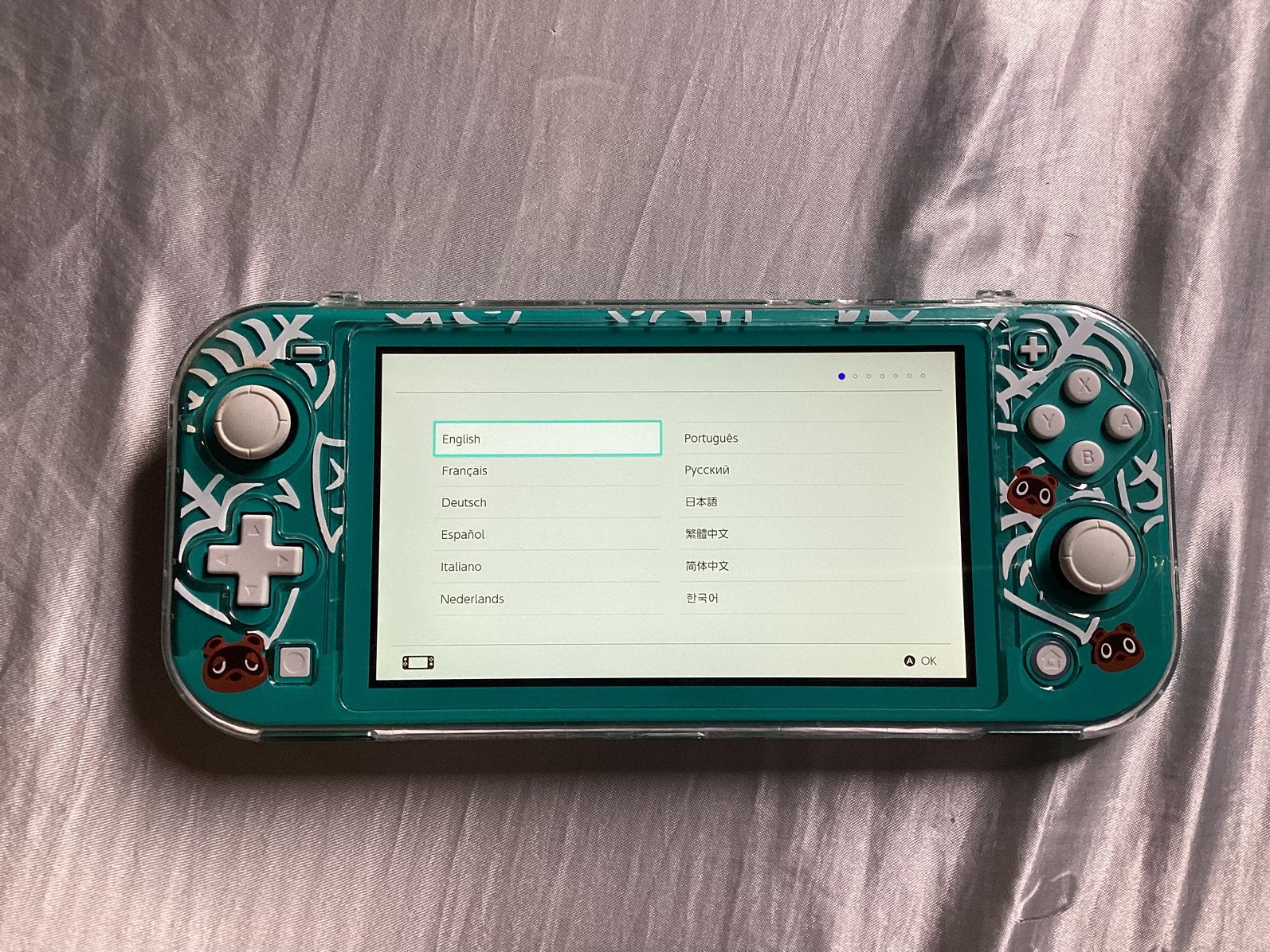 Switch lite peu utilisée, Enlèvement, Turquoise, Comme neuf, Avec housse de protection ou sac