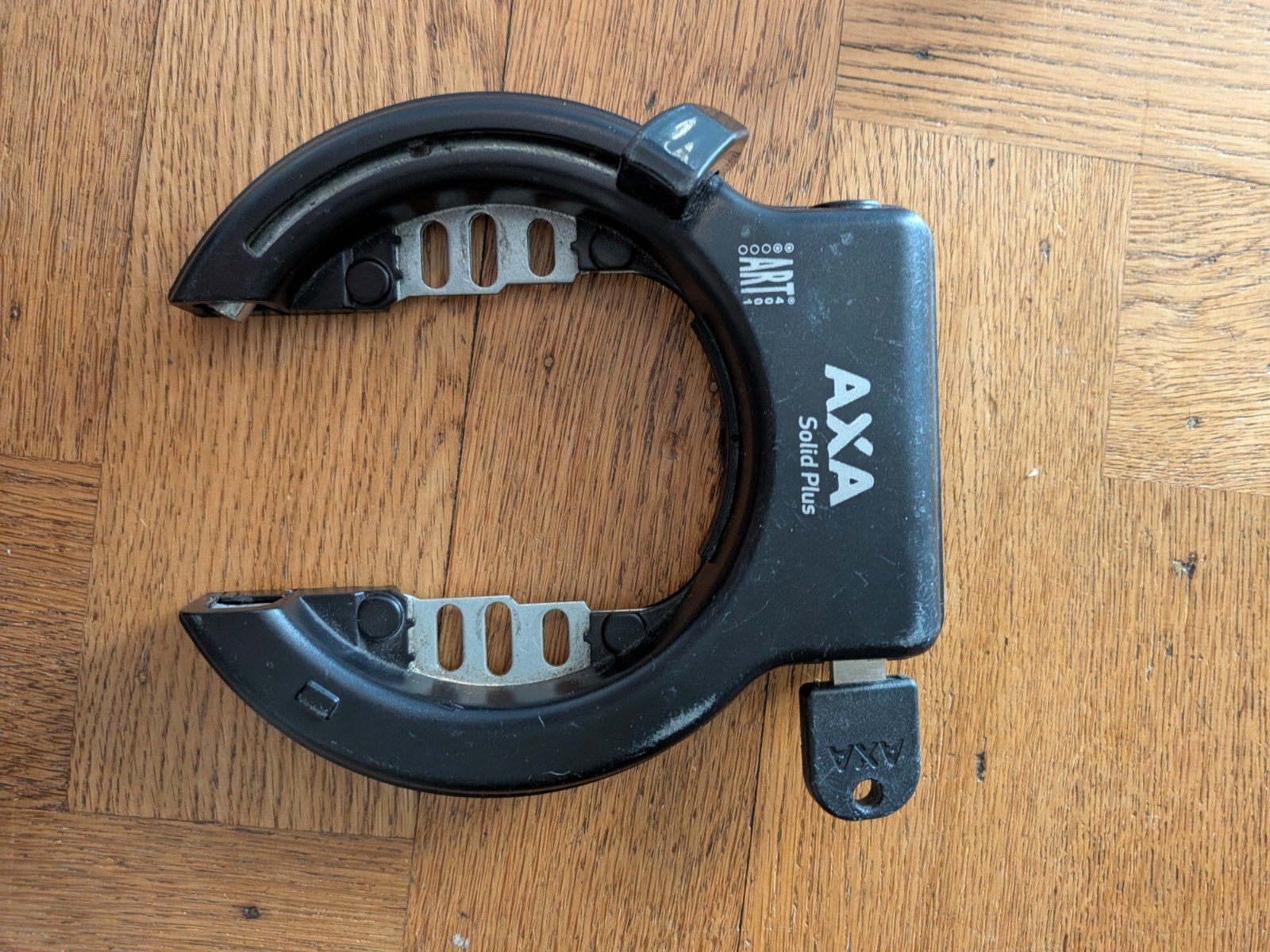 Fietsslot AXA solid plus, Ophalen