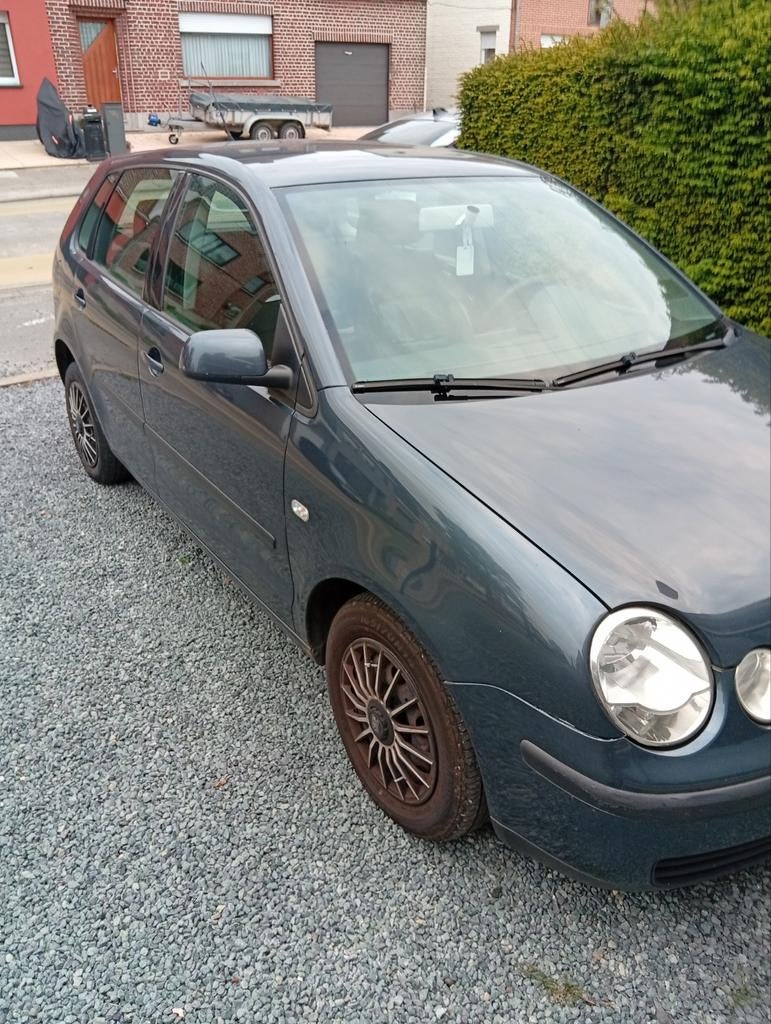 Volkswagen Polo 1.2, Auto's, Voorwielaandrijving, 4 deurs, Zwart, Lederen bekleding