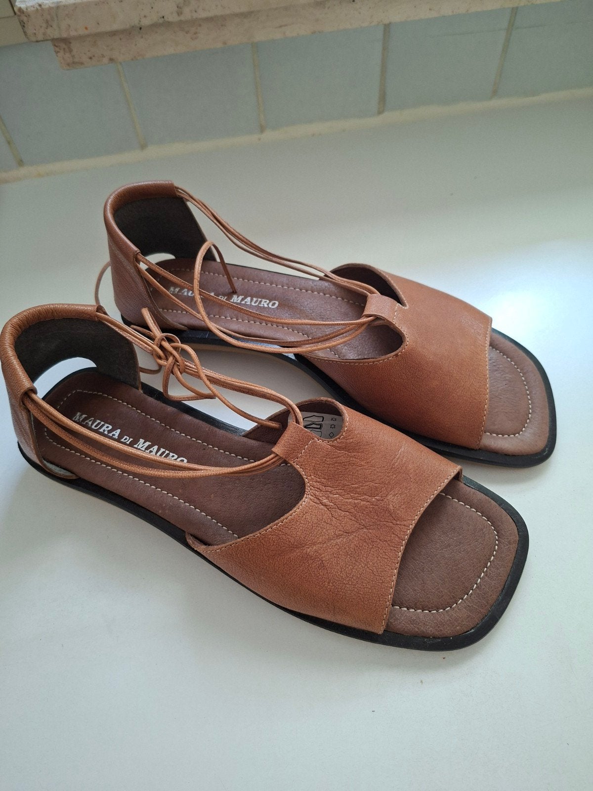 Lederen sandalen 39, Ophalen