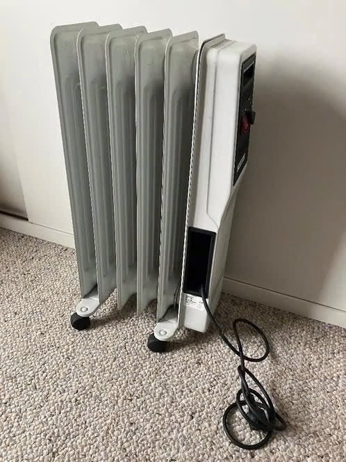 Mobiele elektrische olie radiator., Doe-het-zelf en Bouw, Ophalen, Gebruikt, 800 watt of meer, Radiator