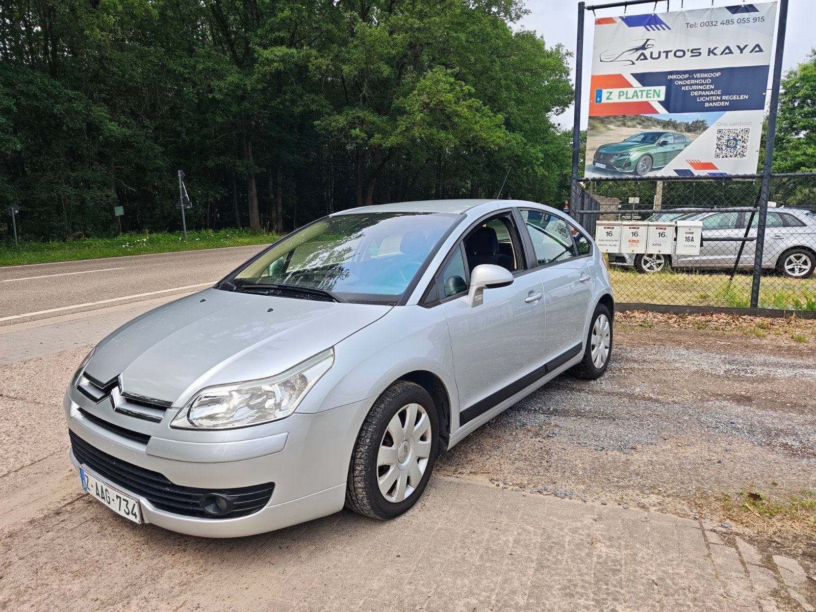 Citroën C4 1.6 benzine km 132.000 bij 2007, Auto's, Stof, Zwart, 4 cilinders, 1600 cc