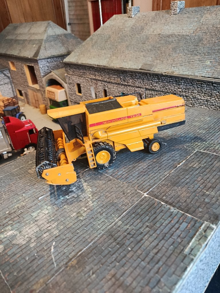 New Holland TX34 Joal 1:42 Oogstmachine, Hobby en Vrije tijd, Modelauto's | 1:32, Ophalen of Verzenden, Gebruikt, Tractor of Landbouw