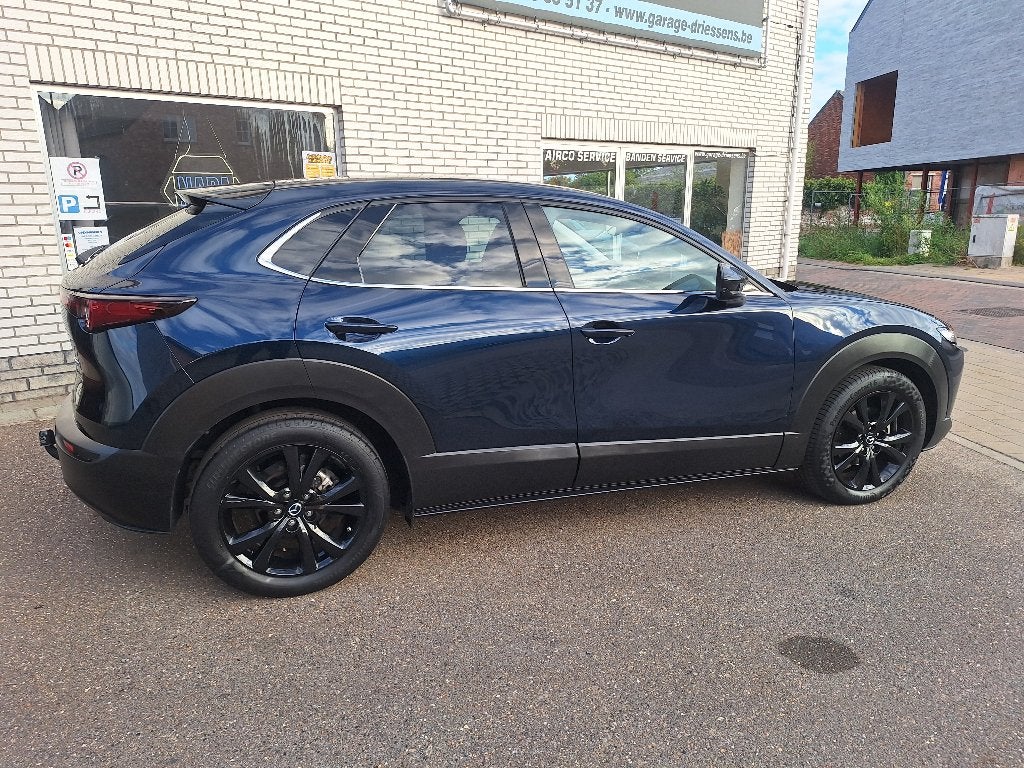 CX-30 5DR WGN 2.0L e-Skyactiv G 122 hp 6AT Homura, Auto's, 90 kW, 1998 cc, Blauw, Leder en Stof