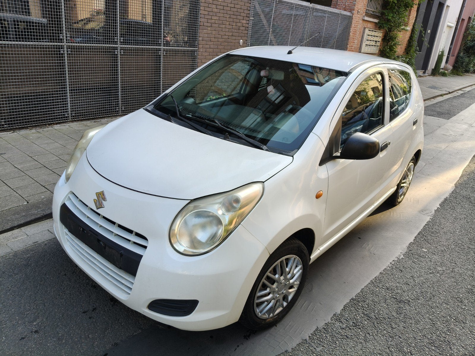 Suzuki Alto benzine met keuring, Auto's, Euro 5, Wit, Handgeschakeld, 5 deurs