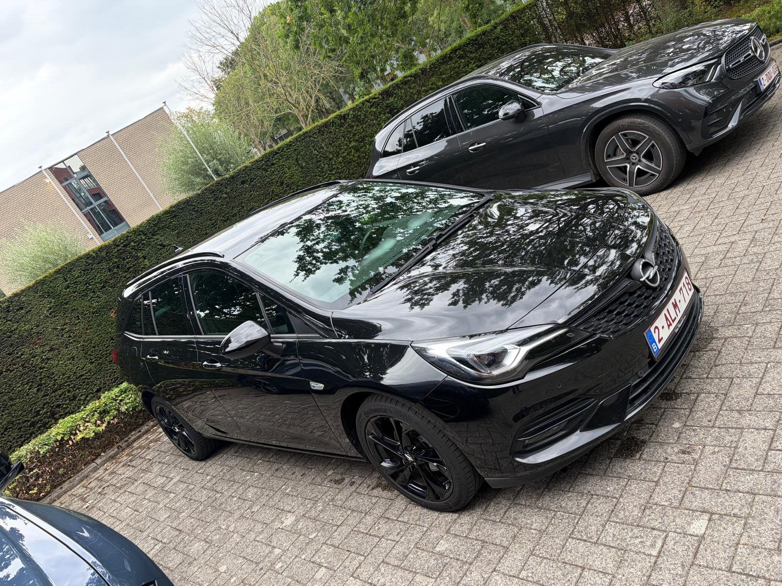 Opel Astra Break 1.2 Benzine – 2020 – 99.150 km, Dealer onderhouden, Zwart, Leder, 5 deurs