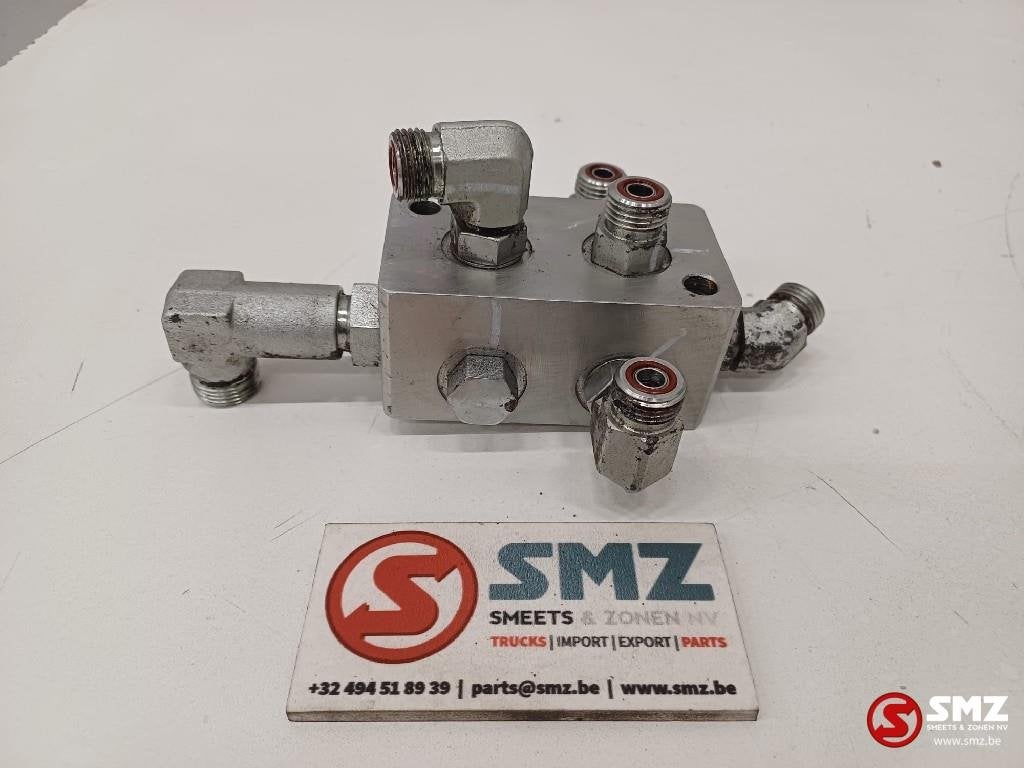 Hydraulic block Caterpillar, Zakelijke goederen